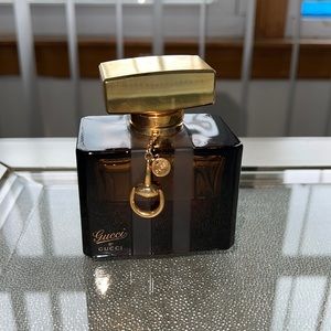 GUCCI BY GUCCI PARFUM . Great condition. Has been sanitized 50% of bottom full .